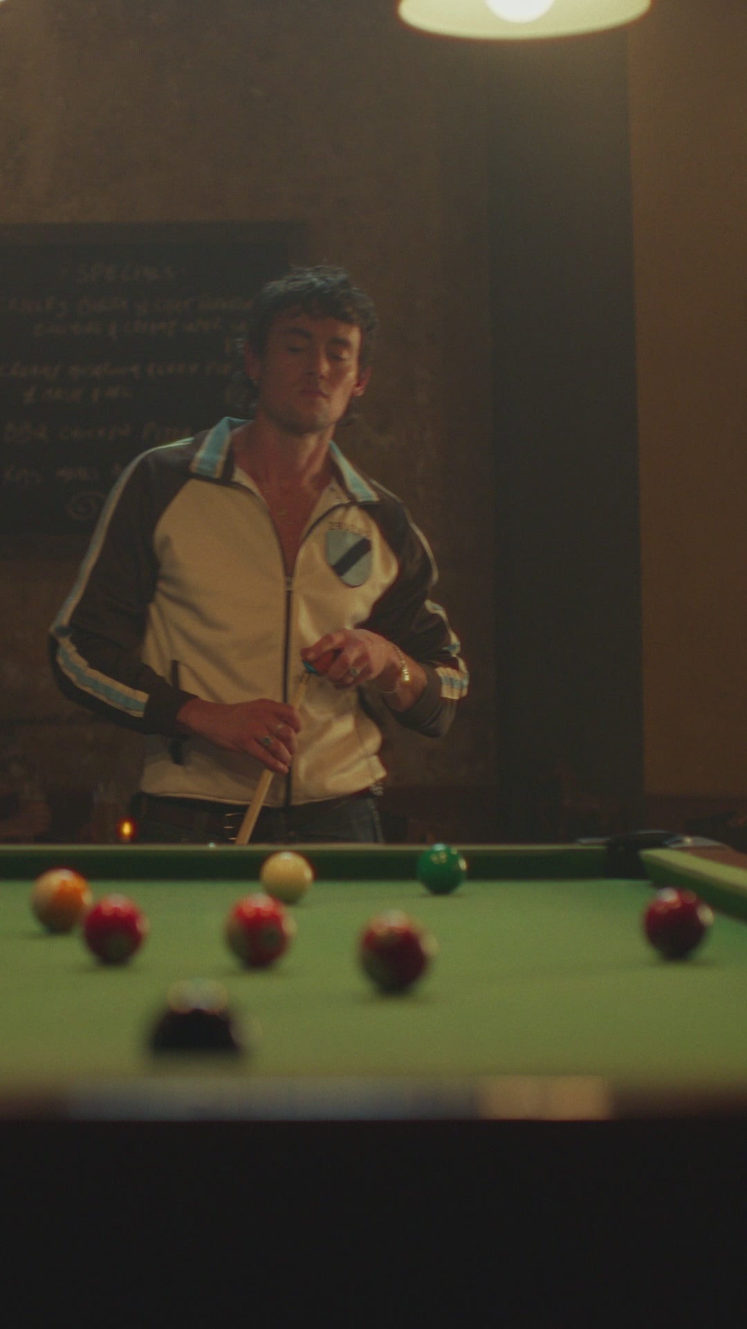 Coopers advert showing a Coopers drinker playing pool and marching to the beat of his own beer